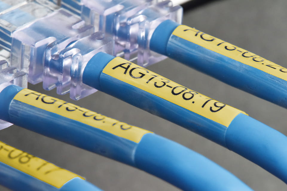 Brother TZe-SL651 - Selbstklebend - Schwarz auf Gelb - Rolle (2,4 cm x 8 m)