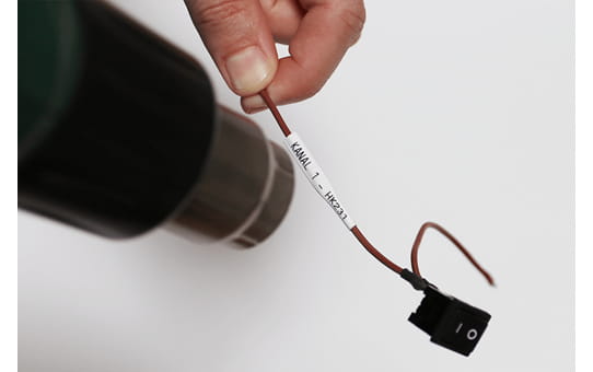 Brother HSe-261E - Schwarz auf Weiß - Rolle (3,1 cm x 1,5 m)